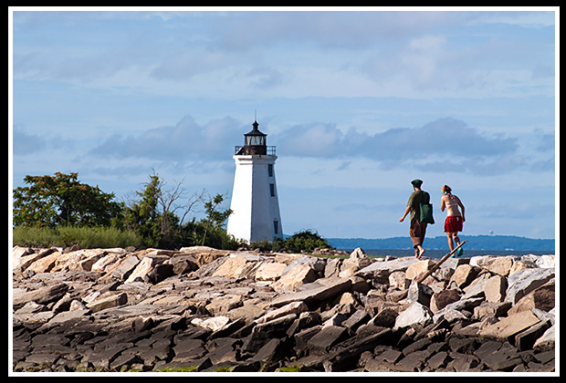 hiking along jetty to Black Rock Harbor lighthouse