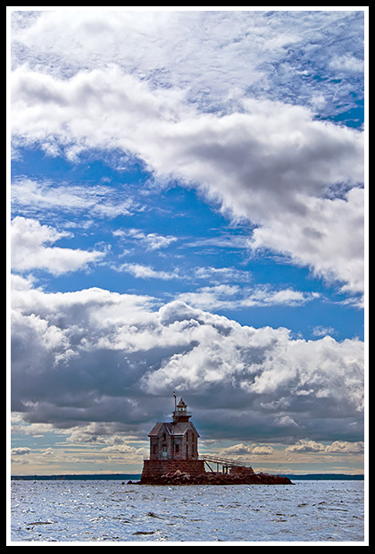 Stratford Shoal (Middleground) lighthouse amoung storm clouds