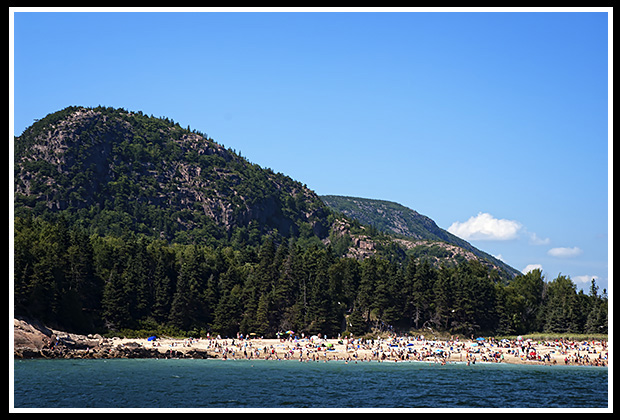 beach wth mountains in background in Acadia National Park