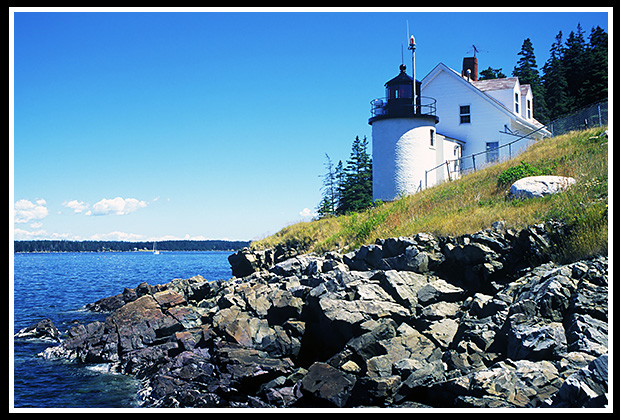 Browns Head lighthouse above rocky shore