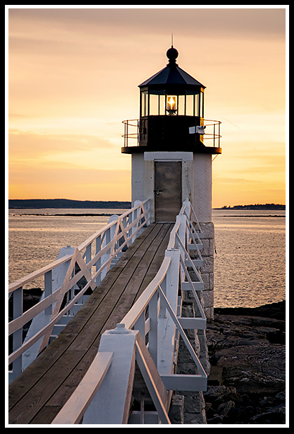 sunset by Marshall Point lighthouse tower
