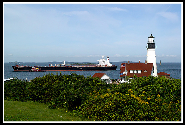 portland lighthouse guiding ship