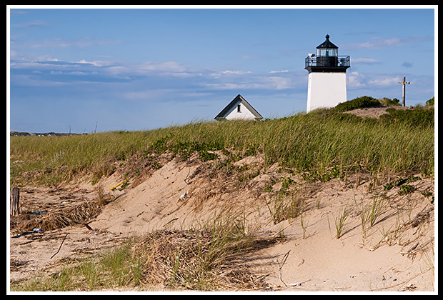Long Point lighthouse over sand dunes