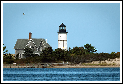 Sandy Neck Light across harbor