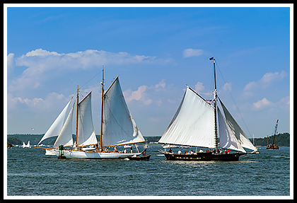 schooners meeting over the water